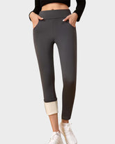 Wärmende High-Waist-Leggings mit Fleecefutter und Taschen